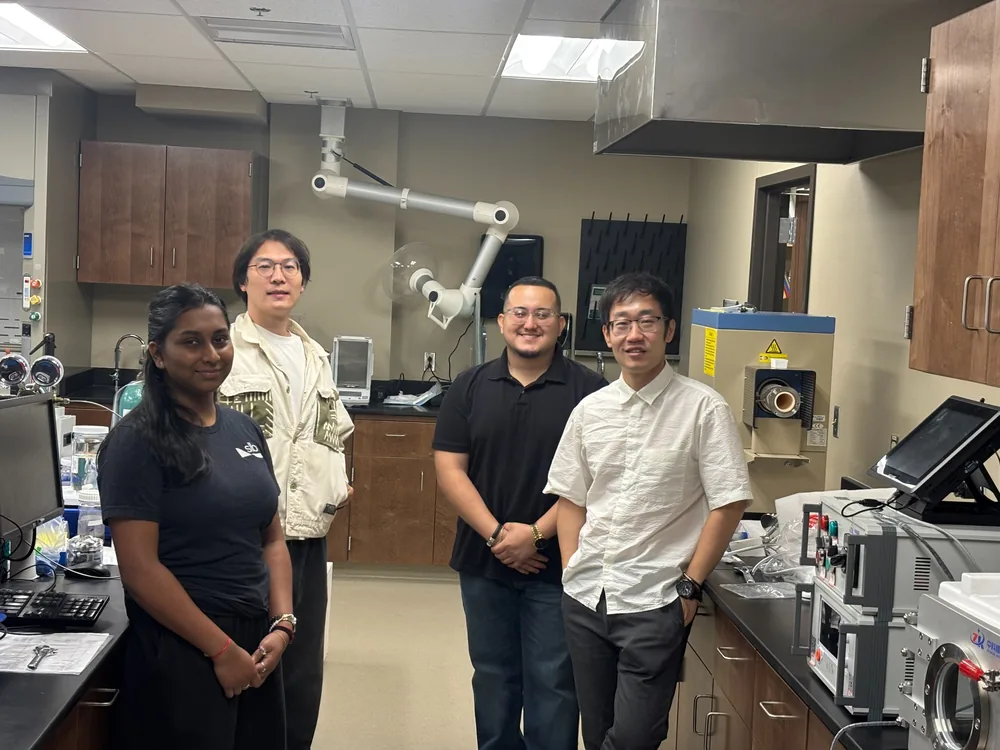 Zhu Interfaces Lab members and CASFER REU summer undergraduate researchers in a Texas Tech laboratory