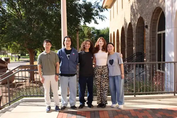 Prof. Yaguang Zhu with Chuanqi Jia, Isaac Acevedo, Rylee Young, and Yan Zhao on the Texas Tech University campus at the start of Fall 2026